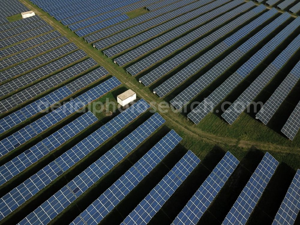 Kanena - Bruckdorf from above - Panel rows of photovoltaic and solar farm or solar power plant in Kanena - Bruckdorf in the state Saxony-Anhalt, Germany