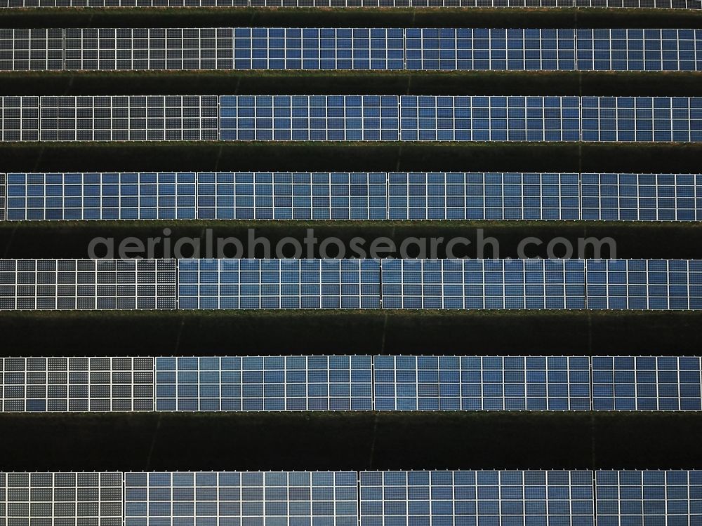 Kanena - Bruckdorf from the bird's eye view: Panel rows of photovoltaic and solar farm or solar power plant in Kanena - Bruckdorf in the state Saxony-Anhalt, Germany
