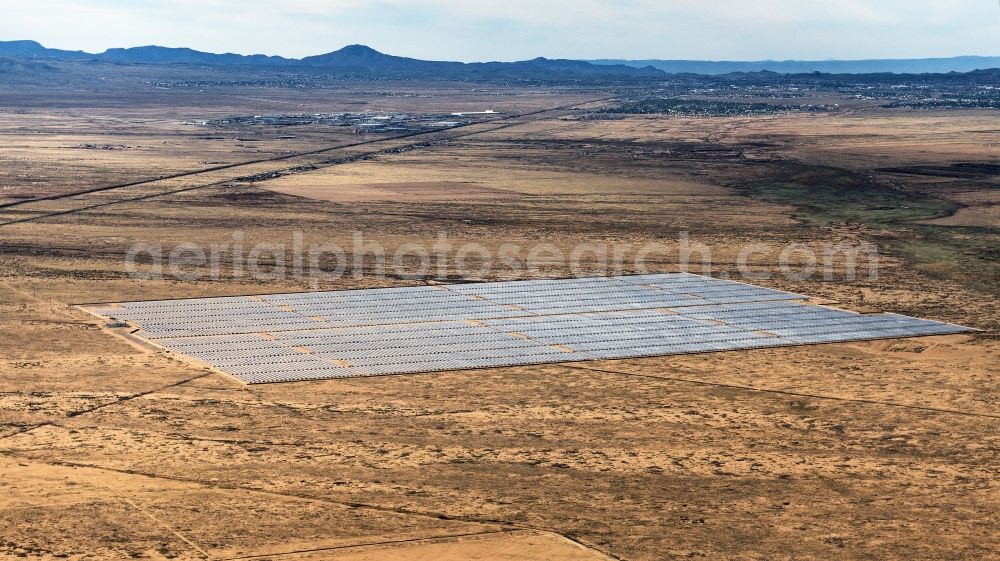 Kingman from above - Panel rows of photovoltaic and solar farm or solar power plant in Kingman in Arizona, United States of America