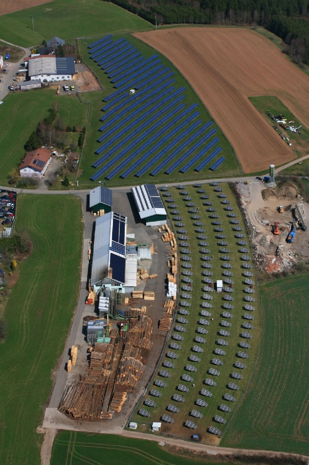 Murg from the bird's eye view: Panel rows of photovoltaic and solar farm or solar power plant in the district Haenner of Murg in the state Baden-Wuerttemberg, Germany