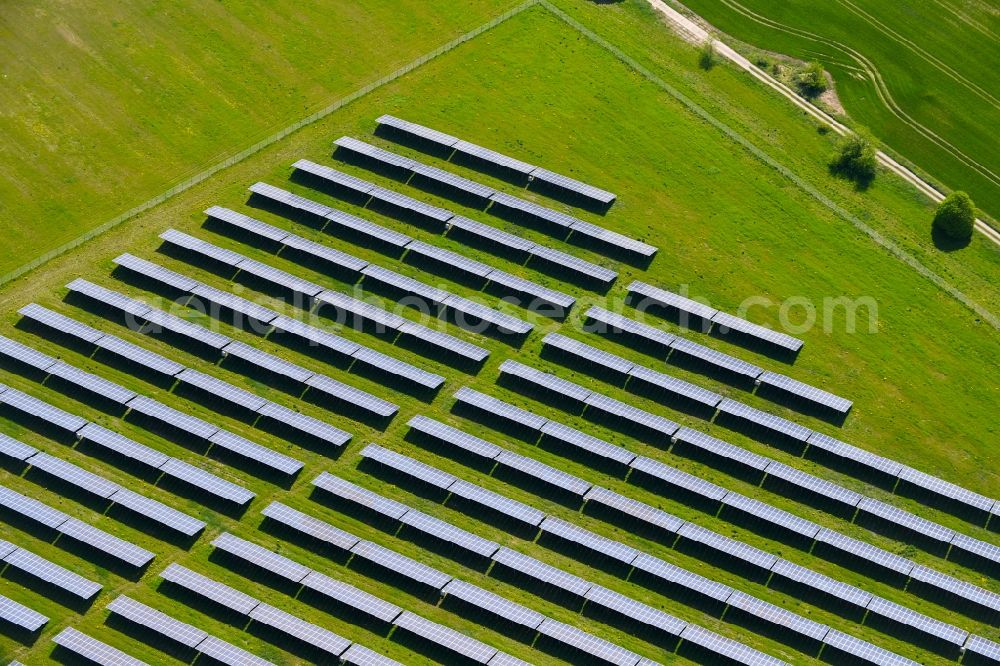 Willmersdorf from the bird's eye view: Panel rows of photovoltaic and solar farm or solar power plant in Willmersdorf in the state Brandenburg, Germany