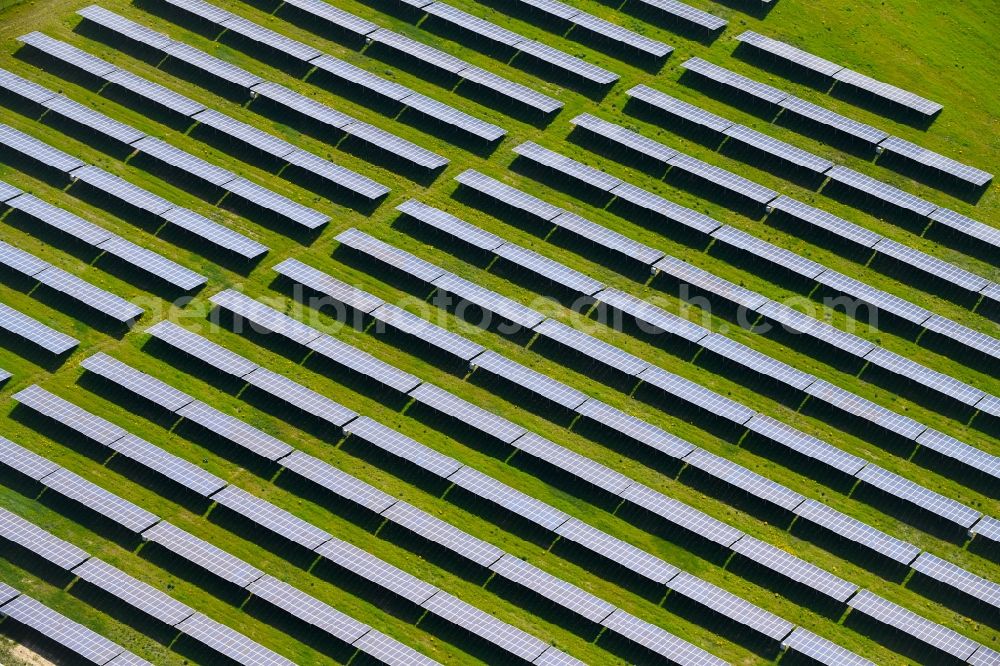 Aerial image Willmersdorf - Panel rows of photovoltaic and solar farm or solar power plant in Willmersdorf in the state Brandenburg, Germany