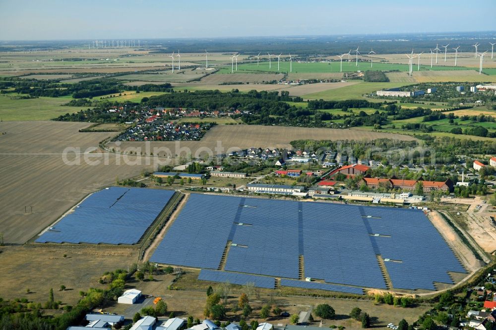 Aerial photograph Wolfen - Panel rows of photovoltaic and solar farm or solar power plant in Wolfen in the state Saxony-Anhalt, Germany