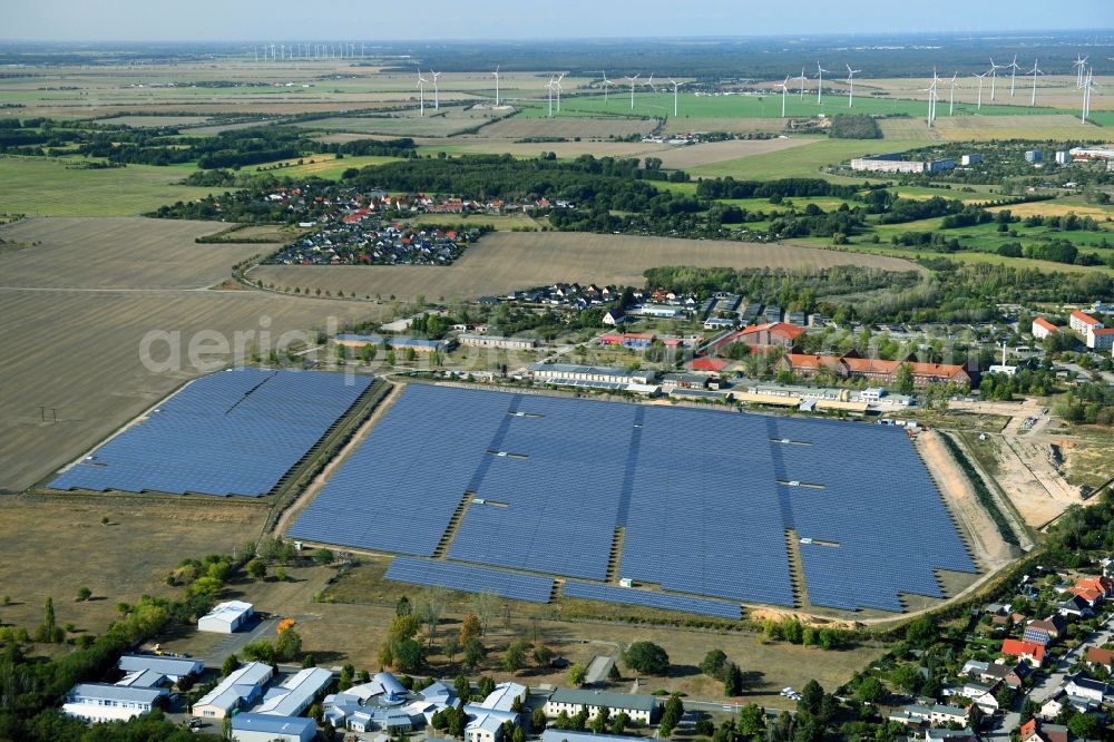 Wolfen from above - Panel rows of photovoltaic and solar farm or solar power plant in Wolfen in the state Saxony-Anhalt, Germany