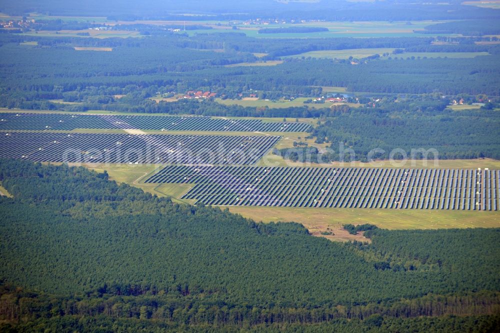 Brandenburg an der Havel from above - View on the largest solar Park in Europe on the former NVA airfield Brandenburg-Briest in Brandenburg an der Havel in the Federal State of Brandenburg. It is a joint project between the company of Q-cells and the investors Luxcara GmbH and the MCG group