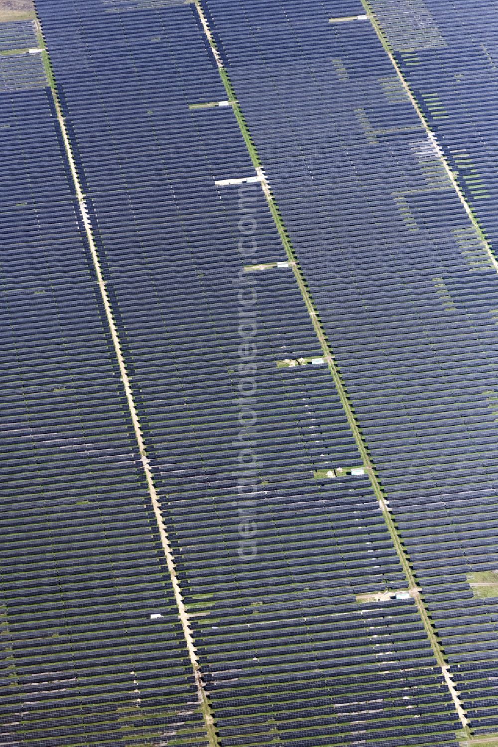 Aerial photograph Brandenburg an der Havel - Solar park on the former NVA airfield Brandenburg-Briest in Brandenburg an der Havel in the Federal State of Brandenburg. It is a joint project between the company of Q-cells and the investors Luxcara GmbH and the MCG group