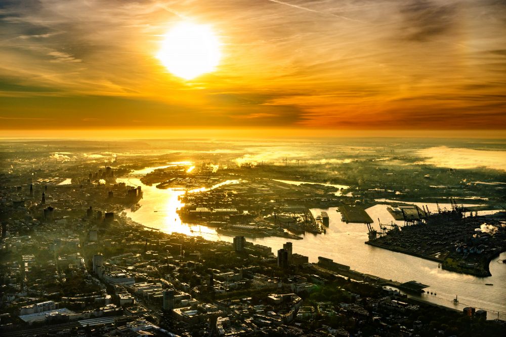 Aerial photograph Hamburg - Sunrise over the countryside of the port on the river course of the Elbe in the district Steinwerder in Hamburg, Germany