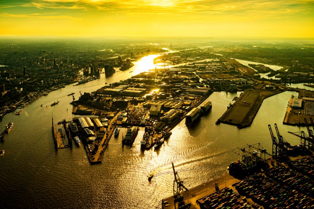 Aerial photograph Hamburg - Sunrise over the countryside of the port on the river course of the Elbe in the district Steinwerder in Hamburg, Germany
