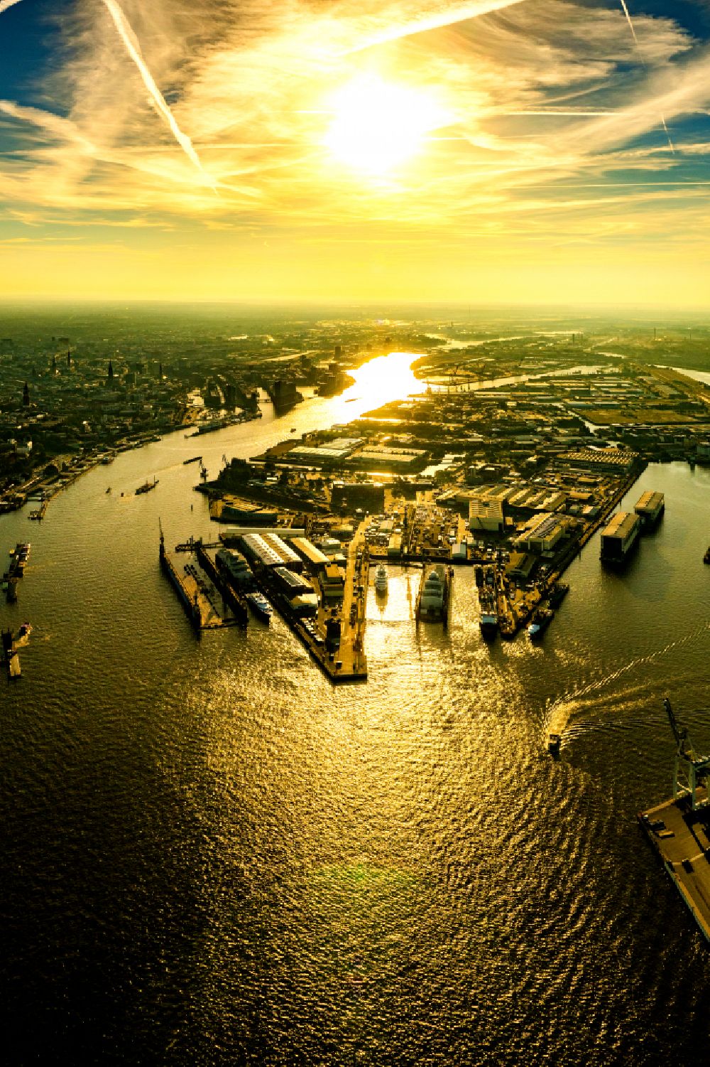 Hamburg from above - Sunrise over the countryside of the port on the river course of the Elbe in the district Steinwerder in Hamburg, Germany