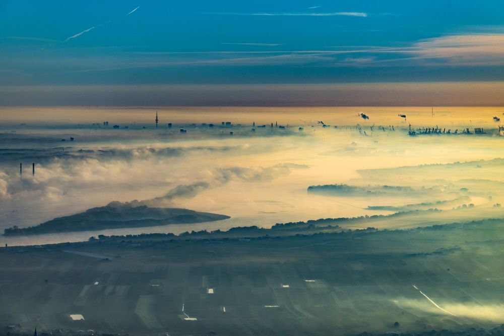 Aerial image Wedel - Sunrise over the landscape of the mist covered Elbe island along the Elbe river in the district Wedel in Hamburg, Germany