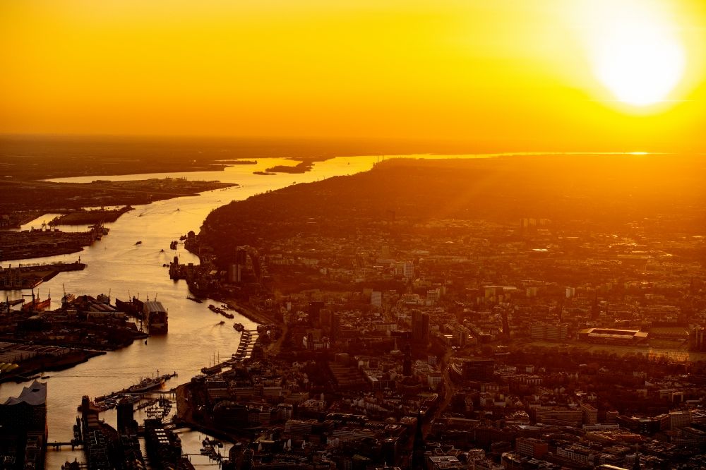Aerial image Hamburg - Sunset over the landscape of the harbor and the Altona fish market on the course of the Elbe river in Hamburg, Germany