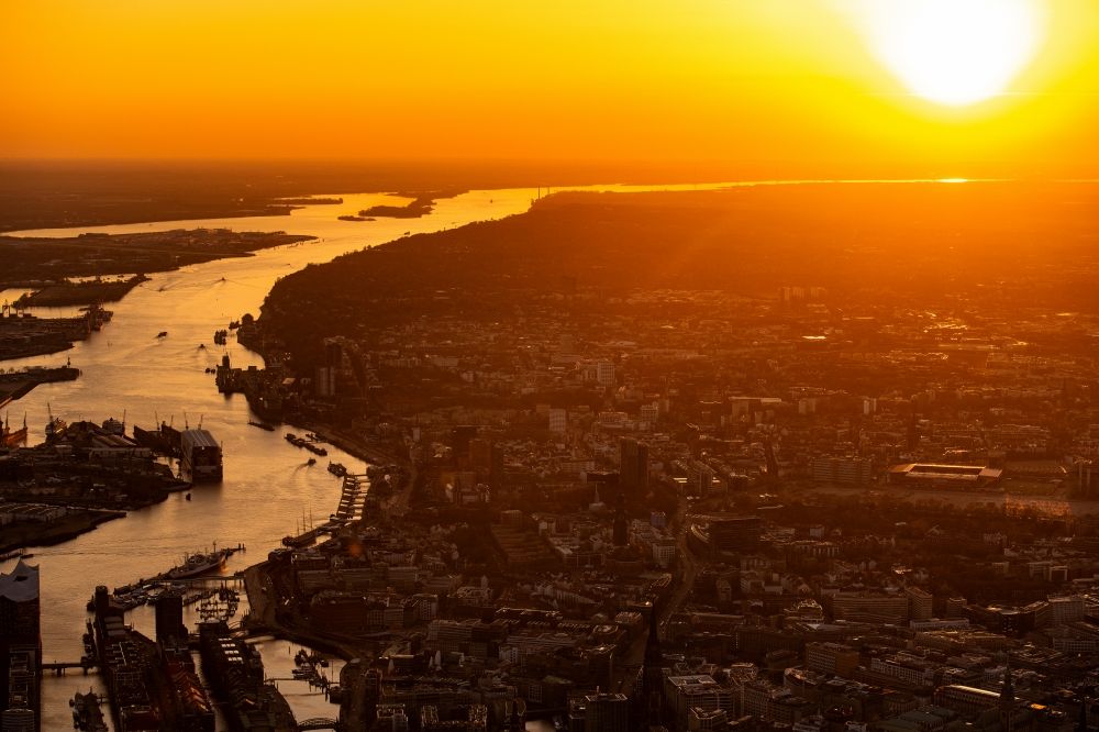 Aerial photograph Hamburg - Sunset over the landscape of the harbor and the Altona fish market on the course of the Elbe river in Hamburg, Germany