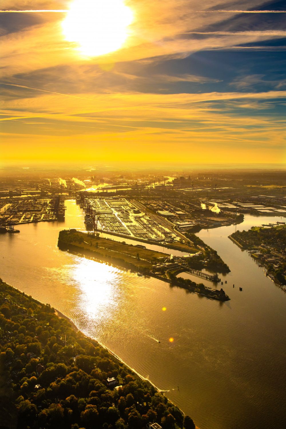 Aerial photograph Hamburg - Sunrise on Container Terminal in the port of the international port of the EUROGATE Container Terminal Hamburg GmbH in Hamburg