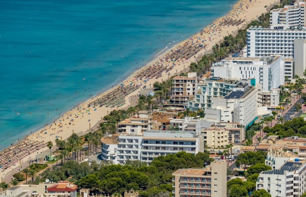 Palma from above - Parasol - rows on the sandy beach in the coastal area overlooking the hotel complexes at Ballermann 9 along the Carretera de l'Arenal in the district Platja de Palma in Palma in Balearic island of Mallorca, Spain