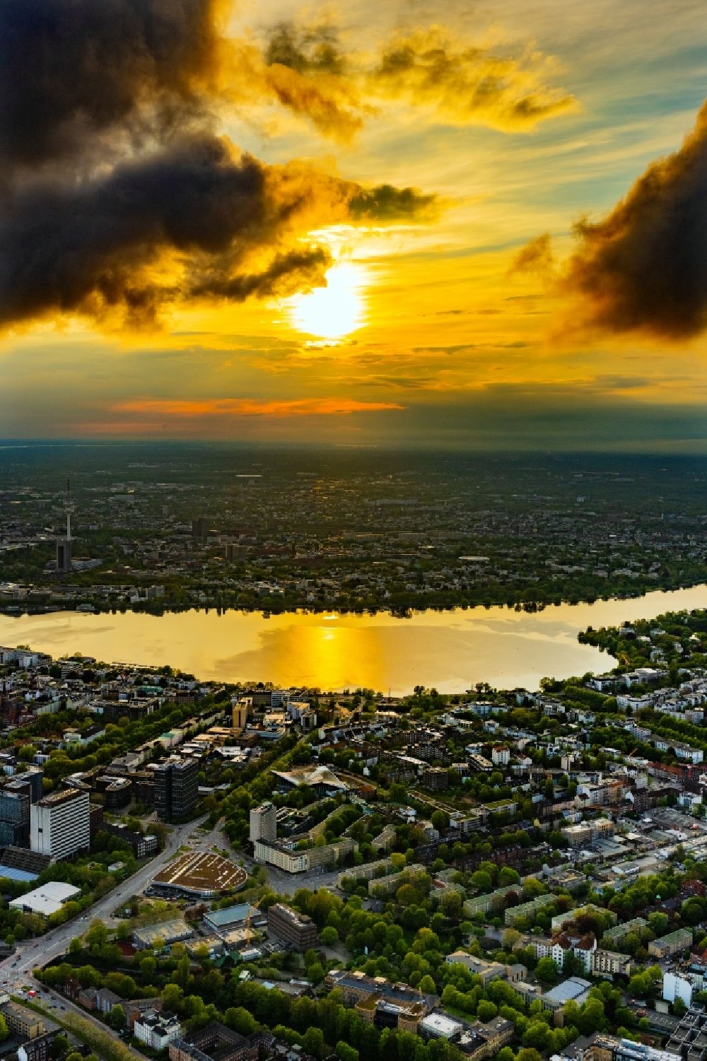 Hamburg from above - Sunset over the city view of the downtown area on the shore areas of Binnenalster and Aussenalster in the district Sankt Georg in Hamburg, Germany