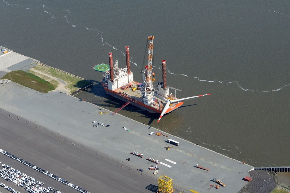 Aerial photograph Cuxhaven - Ship - specialized vessel to wind power station - installation in offshore wind farms in the port in Cuxhaven in the state Lower Saxony