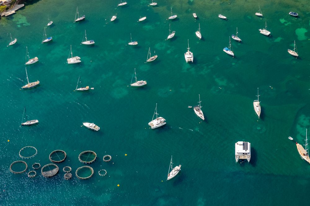 Port d'Andratx from above - Pleasure boat and sailing boat mooring and boat moorings in the harbor of seashore in Port d'Andratx in Balearic islands, Spain
