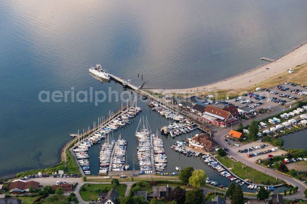 Aerial image Langballigholz - Pleasure boat and sailing boat mooring and boat moorings in the harbor on the Baltic Sea beach on street Am Hafen in Langballigholz in the state Schleswig-Holstein, Germany