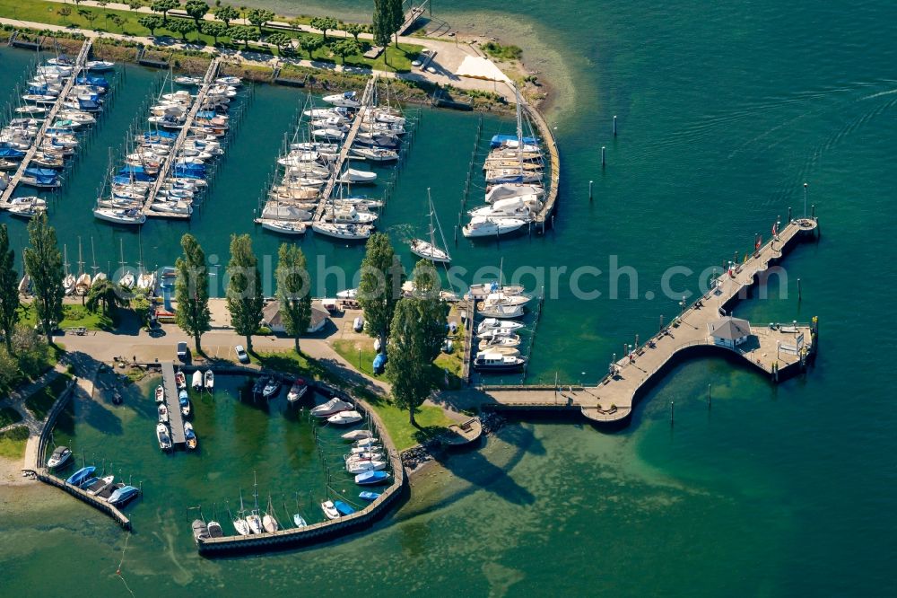 Aerial image Unteruhldingen - Pleasure boat and sailing boat mooring and boat moorings in the harbor on the bank area of Bodensees in Unteruhldingen in the state Baden-Wuerttemberg, Germany