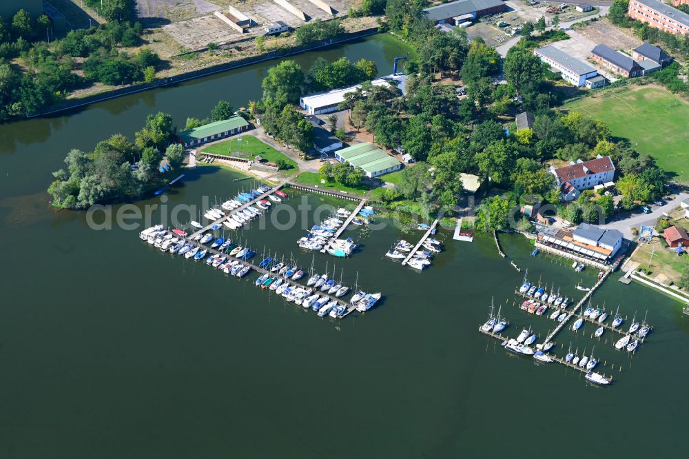 Kirchmöser from the bird's eye view: Pleasure boat and sailing boat landing stage and boat moorings in the harbor on the shore of the Plauer See in Kirchmoser in the state Brandenburg, Germany