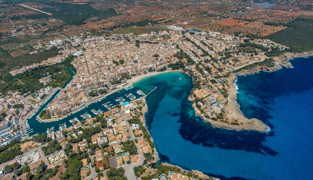 Aerial image Manacor - Pleasure boat marina with docks and moorings on the shore area Cala Manacor in Manacor in Balearic island of Mallorca, Spain