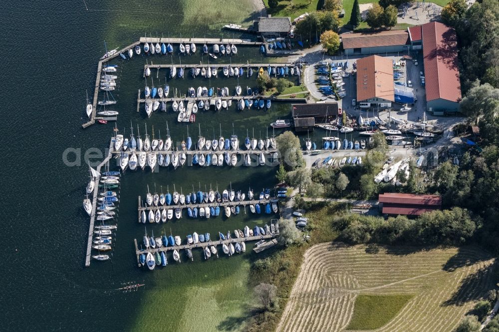 Aerial photograph Prien am Chiemsee - Pleasure boat marina with docks and moorings on the shore area of Chiemsee in Sportboothafen Stippelwerft in Prien am Chiemsee in the state Bavaria, Germany