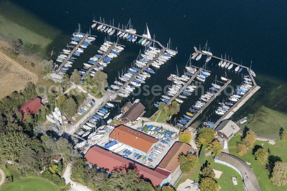 Aerial photograph Prien am Chiemsee - Pleasure boat marina with docks and moorings on the shore area of Chiemsee in Sportboothafen Stippelwerft in Prien am Chiemsee in the state Bavaria, Germany