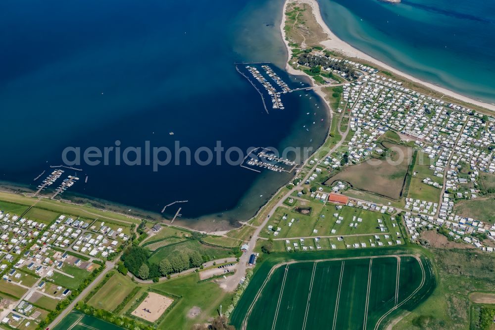 Aerial photograph Neukirchen - Pleasure boat marina with docks and moorings on the shore area of the Grossenboder Binnensee in Neukirchen in the state Schleswig-Holstein, Germany