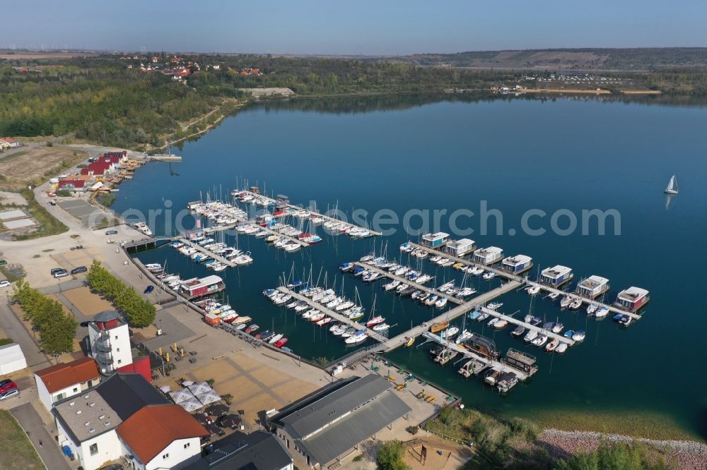 Mücheln (Geiseltal) from the bird's eye view: Pleasure boat marina with docks and moorings on the shore area of Geiseltalsee of Marina Muecheln GmbH on Hafenplatz in Muecheln (Geiseltal) in the state Saxony-Anhalt, Germany