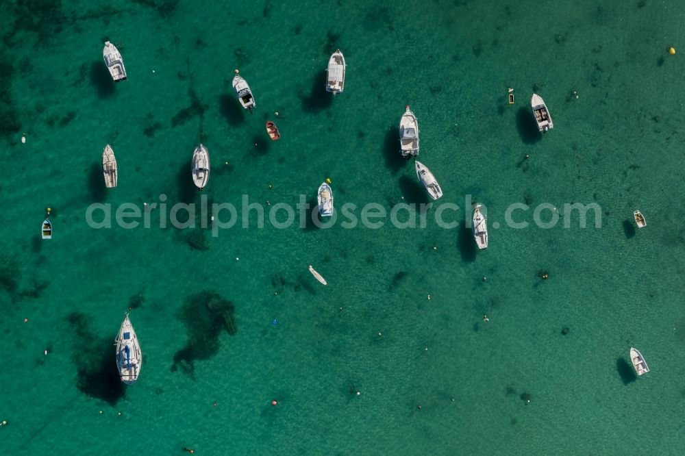 Llucmajor from above - Pleasure boat marina with docks and moorings on the shore area the Mediterranean sea in Llucmajor in Balearic Islands, Spain