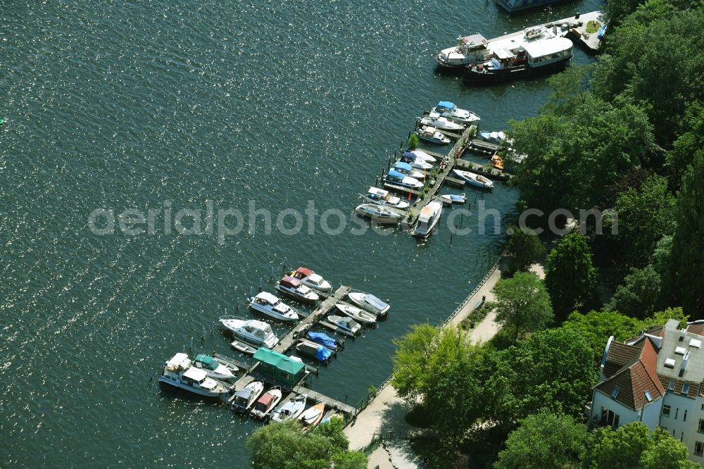 Aerial image Berlin - Pleasure boat marina with docks and moorings on the shore area of Spree River in the district Niederschoeneweide in Berlin, Germany