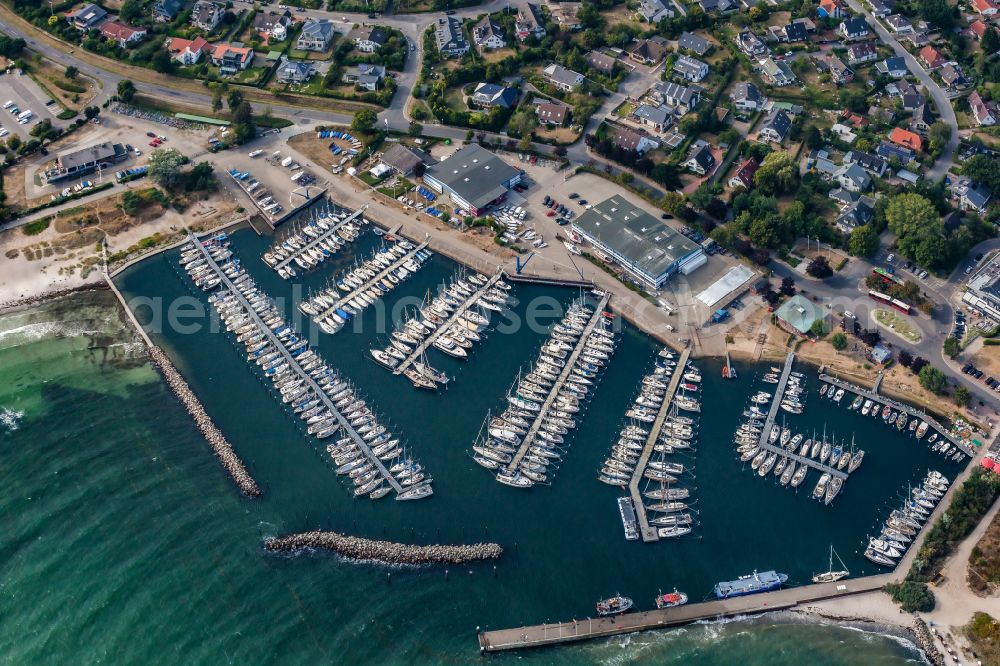 Aerial photograph Strande - Sporthafen Strande on Strandstrasse in Strande in the state Schleswig-Holstein, Germany. Home port of the sailing clubs KYC Kieler Yacht Club and Yachtclub Strande YCS with boat halls and boat filling station
