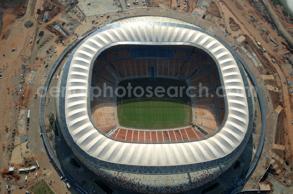 Johannesburg from above - Sports facility grounds of the Arena stadium FNB Stadium/Soccer on City Soccer City Ave in the district Nasrec in Johannesburg South in Gauteng, South Africa