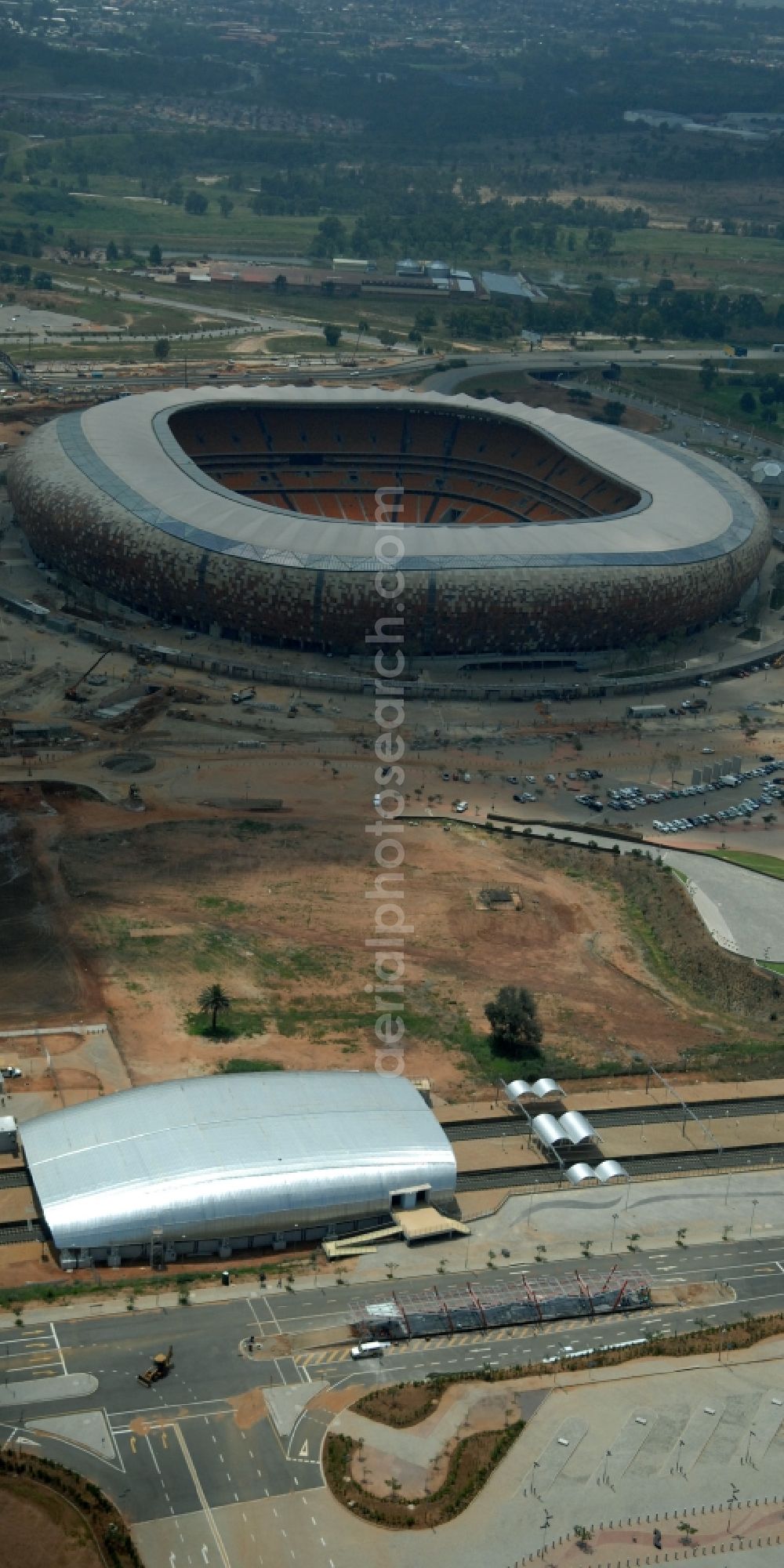 Johannesburg from the bird's eye view: Sports facility grounds of the Arena stadium FNB Stadium/Soccer on City Soccer City Ave in the district Nasrec in Johannesburg South in Gauteng, South Africa