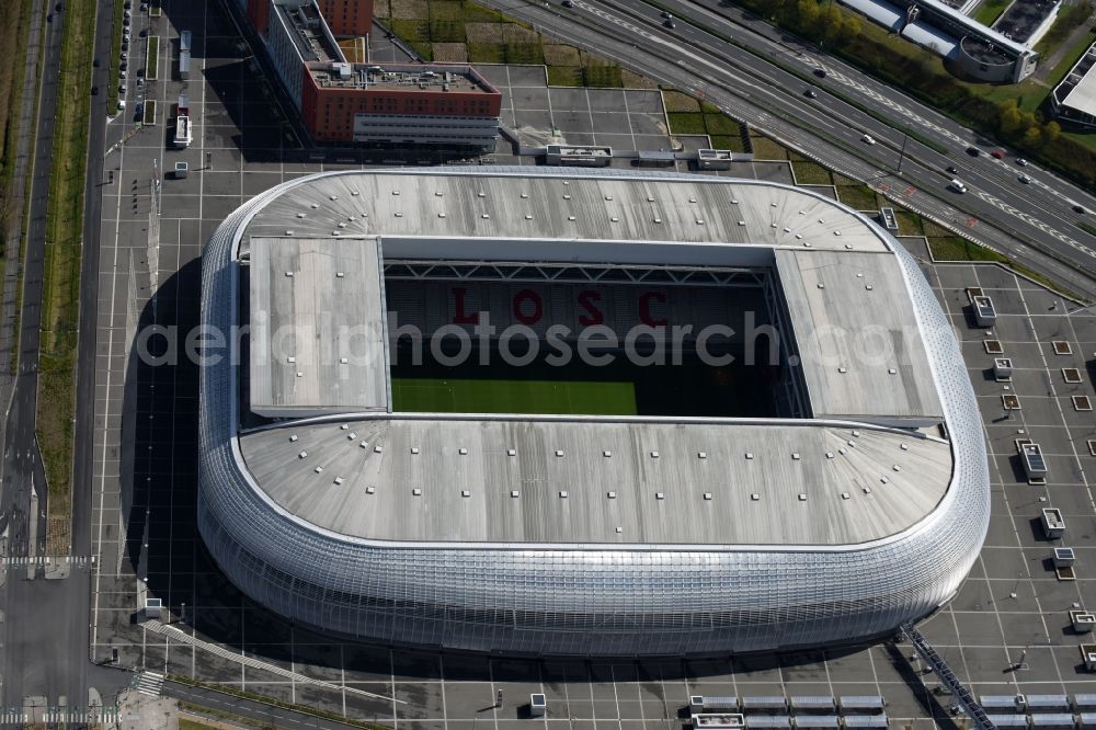 Lille from above - Sports facility grounds of the arena of the stadium Stade Pierre-Mauroy before European Football Championship Euro 2016 destrict Villeneuve-d'Ascq in Lille in Nord-Pas-de-Calais Picardy, France. The building was by the Eiffage group designed by the architect Valode et Pistre architectes and Accueil - Atelier Ferret Architectures