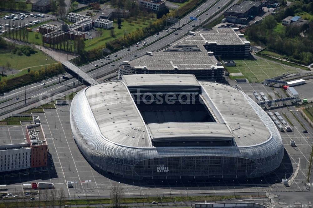 Aerial photograph Lille - Sports facility grounds of the arena of the stadium Stade Pierre-Mauroy before European Football Championship Euro 2016 destrict Villeneuve-d'Ascq in Lille in Nord-Pas-de-Calais Picardy, France. The building was by the Eiffage group designed by the architect Valode et Pistre architectes and Accueil - Atelier Ferret Architectures