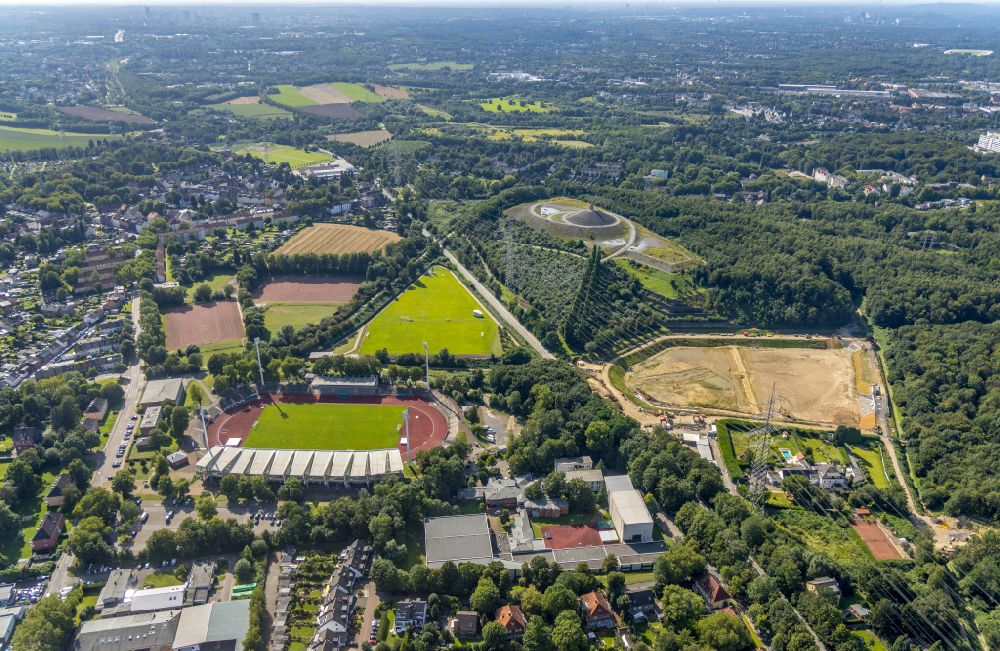 Bochum from above - Sports facility grounds of the Arena stadium Lohrheidestadion overlooking the Landmarke Himmelstreppe by the artist Herman Prigann on a former slag heap in the district Wattenscheid in Bochum in the state North Rhine-Westphalia