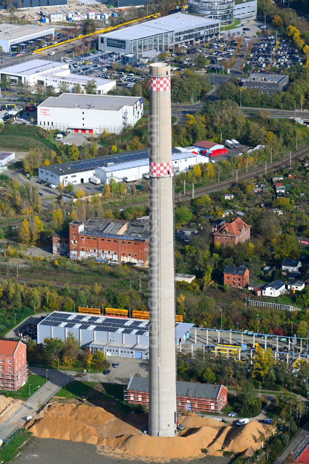 Leipzig from the bird's eye view: Blasting preparation work on the tower structure of the former combined heat and power plant chimney on street Arno-Nitzsche-Strasse in the district Connewitz in Leipzig in the state Saxony, Germany