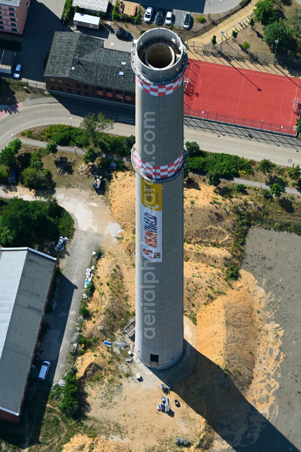 Leipzig from the bird's eye view: Blasting preparation work on the tower structure of the former combined heat and power plant chimney on street Arno-Nitzsche-Strasse in the district Connewitz in Leipzig in the state Saxony, Germany