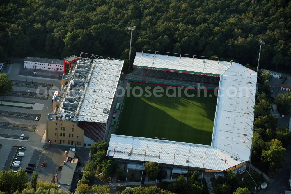 Berlin from above - View of the football stadium Alte Foersterei with its new grandstand the district of Koepenick in Berlin. The pitch is homestead for the football games of FC Union Berlin