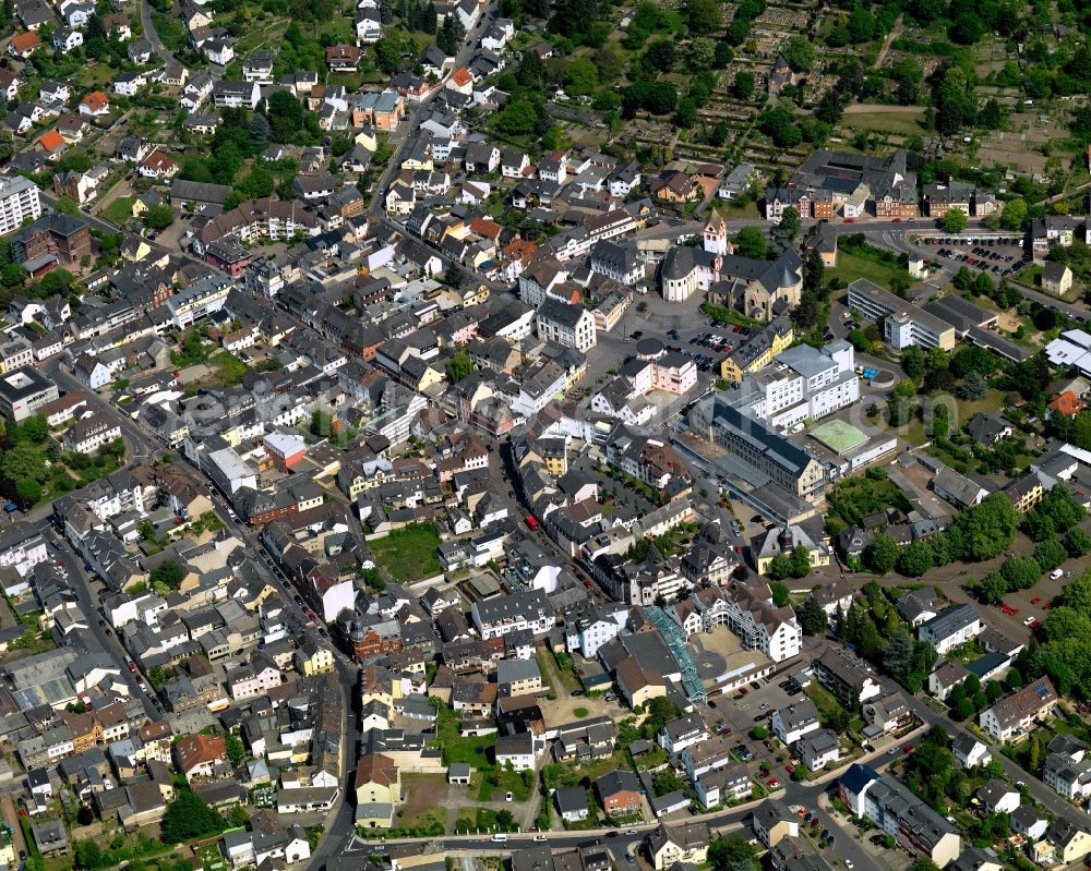 Bendorf from the bird's eye view: View of the town of Bendorf in the state of Rhineland-Palatinate. The town is located in the county district of Mayen-Koblenz on the right riverbank of the river Rhine. The town is an official tourist resort and is located on the German Limes Road. It consists of the four parts Bendorf, Sayn, Muelhofen and Stromberg. The federal highway B42 takes its course through the town and meets the federal motorway A48 in the South of the town