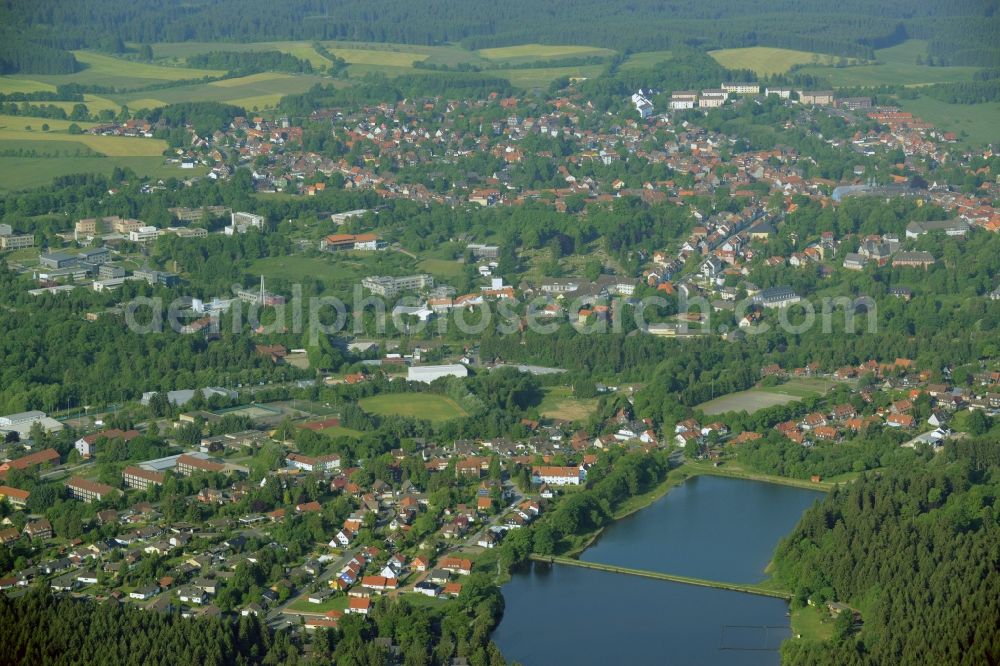Clausthal-Zellerfeld from the bird's eye view: View of the town of Clausthal-Zellerfeld in the state of Lower Saxony. The mountain and university town is an official spa resort in the county district of Goslar. Two ponds are located in the East of the town which is the location of the Technical University of Clausthal