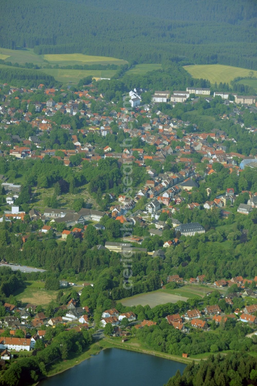 Clausthal-Zellerfeld from above - View of the town of Clausthal-Zellerfeld in the state of Lower Saxony. The mountain and university town is an official spa resort in the county district of Goslar. Two ponds are located in the East of the town which is the location of the Technical University of Clausthal