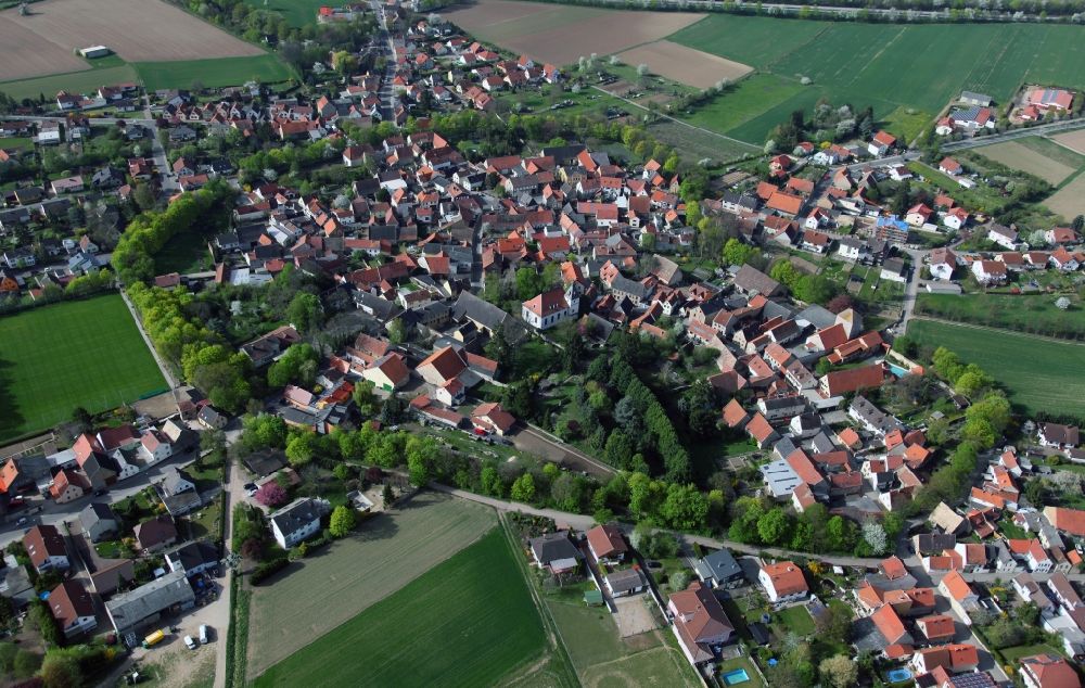 Aerial image Eppelsheim - City view of Eppelsheim, a municipality of Rheinhessen in the district Alzey Worms in the state of Rhineland-Palatinate. The locality belongs to the municipality Alzey-Land. The village ditch, also called Effenring, included heart-shaped the medieval village and served with its heaped high ramparts as a village fastening