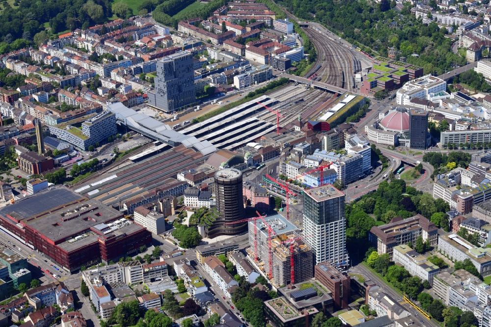 Basel from the bird's eye view: City view on down town at the railway Station SBB, the BIS Tower ( Bank for International Settlements ) and the market hall in Basel, Switzerland