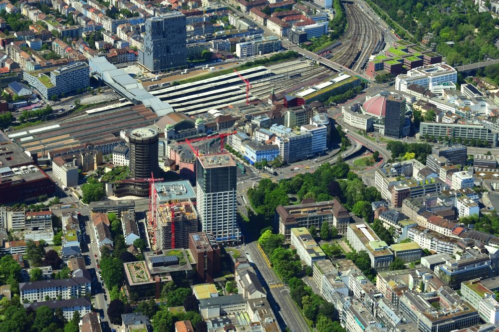 Aerial image Basel - City view on down town at the railway Station SBB, the BIS Tower ( Bank for International Settlements ) and the market hall in Basel, Switzerland