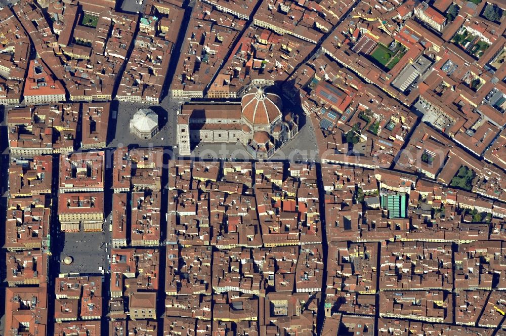 Aerial image Florenz - City view from the downtown area of Florence in Italy. Image center in the Cathedral of Santa Maria del Fiore with the Campanile by Giotto di Bondone. The dome of Filippo Brunelleschi is considered technical masterpiece of the Renaissance