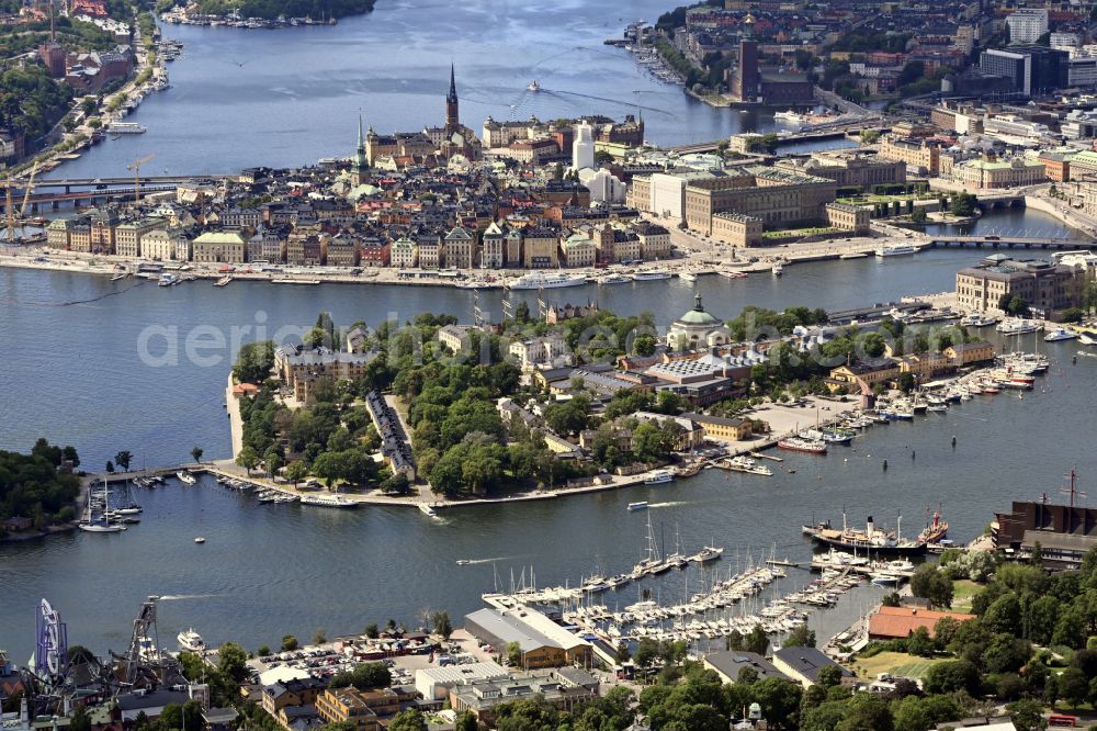 Stockholm from above - City view on down town with the islands Stadsholmen and Skeppsholmen in the district Gamla stan in Stockholm in Stockholms laen, Sweden