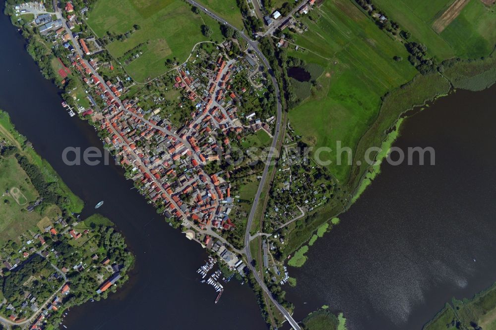 Havelsee from above - Cityscape of downtown area and the city center on the banks of Beetzsees in Havelsee in Brandenburg