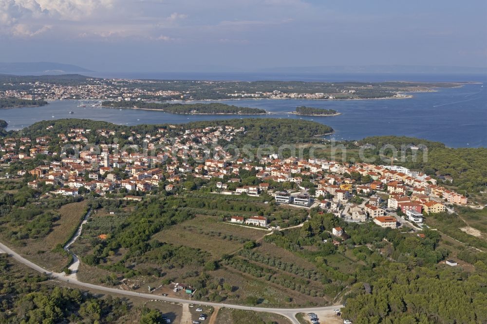 Premantura from the bird's eye view: City view on sea coastline in Premantura in Istirien - Istarska zupanija, Croatia